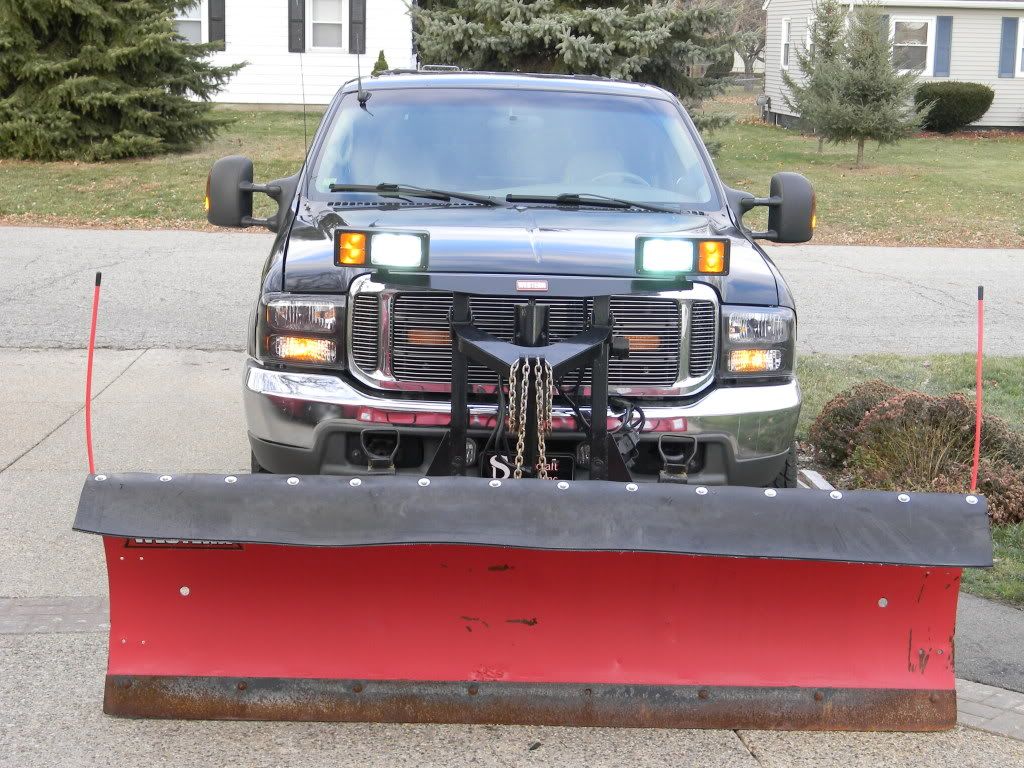 Pictures of the Excursion, HID's installed on plow lights, also a video