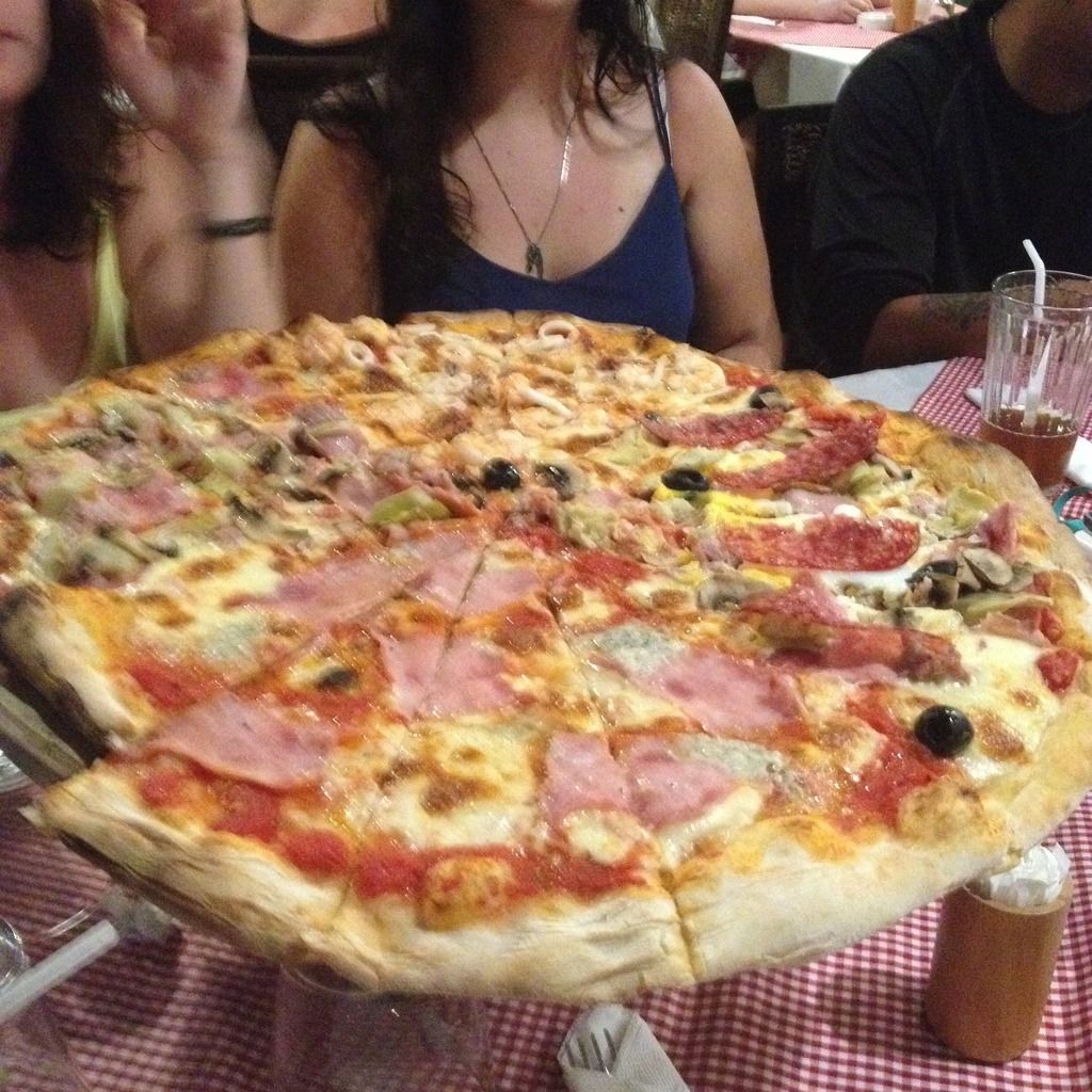 Giant pizza at Angelina Pizzeria Ristorante Italiano in Malapascua Island, Daanbantayan, Cebu, Philippines